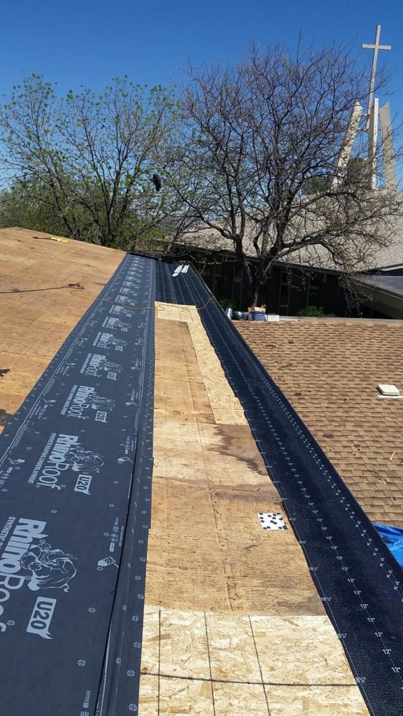New roof being installed on a church in Denver, Colorado